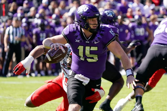 TCU Horned Frogs quarterback Max Duggan avoids the pressure from Texas Tech.